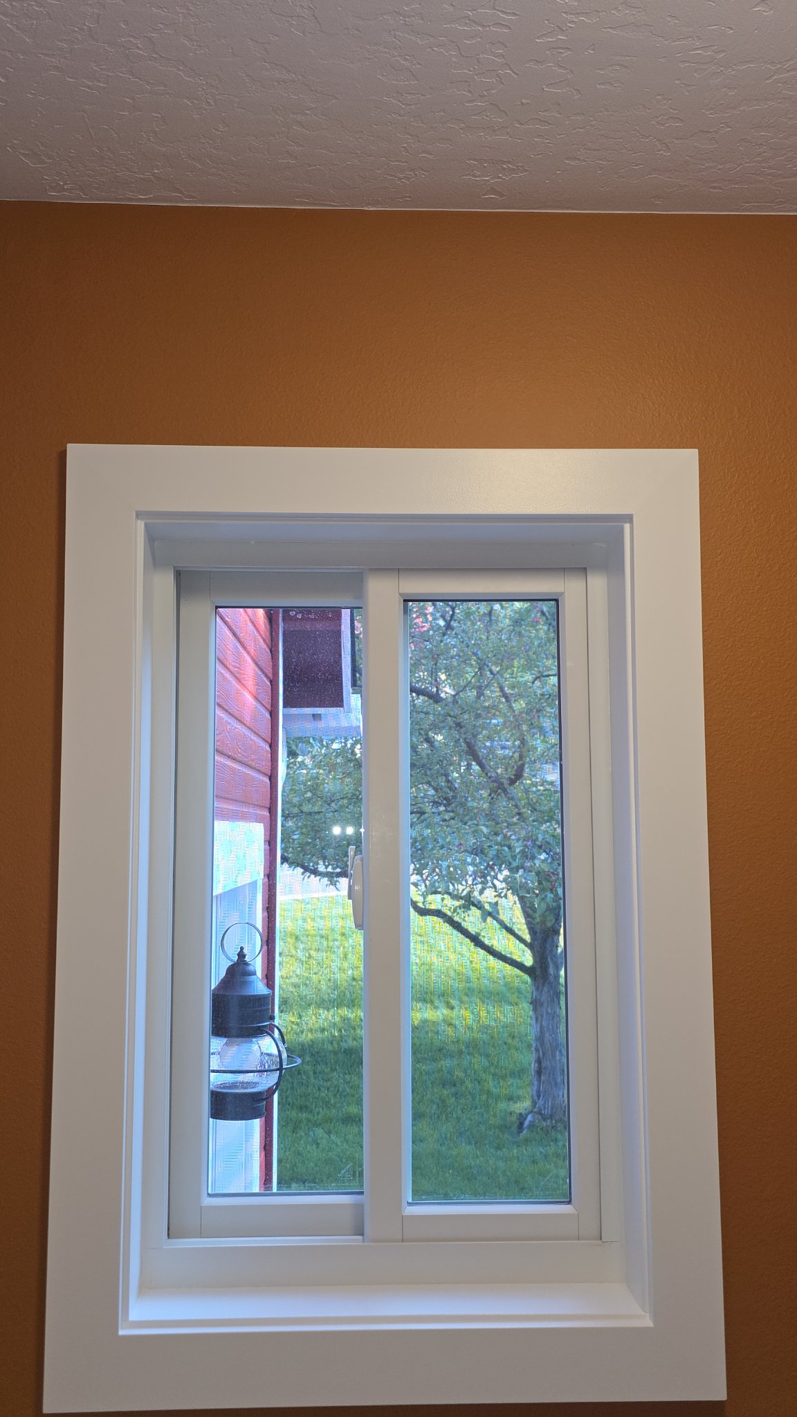 Close-up of white window casing trim work in Missoula